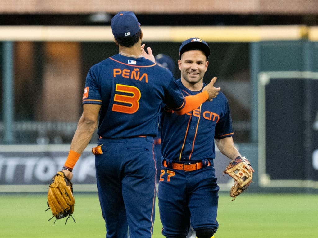 Jeremy Pena and Jose Altuve are getting used to having postgame celebrations together. (Photo by F. Carter Smith)