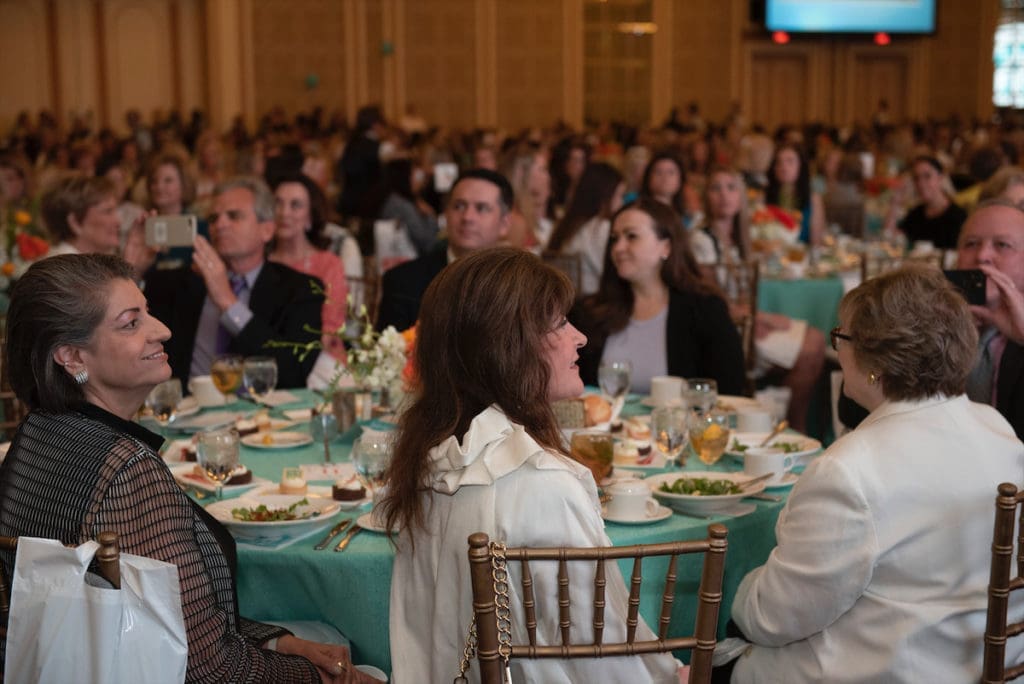 Candid photo from the Junior League of Dallas Centennial Milestones  Luncheon. (Photo by Tamytha Cameron)