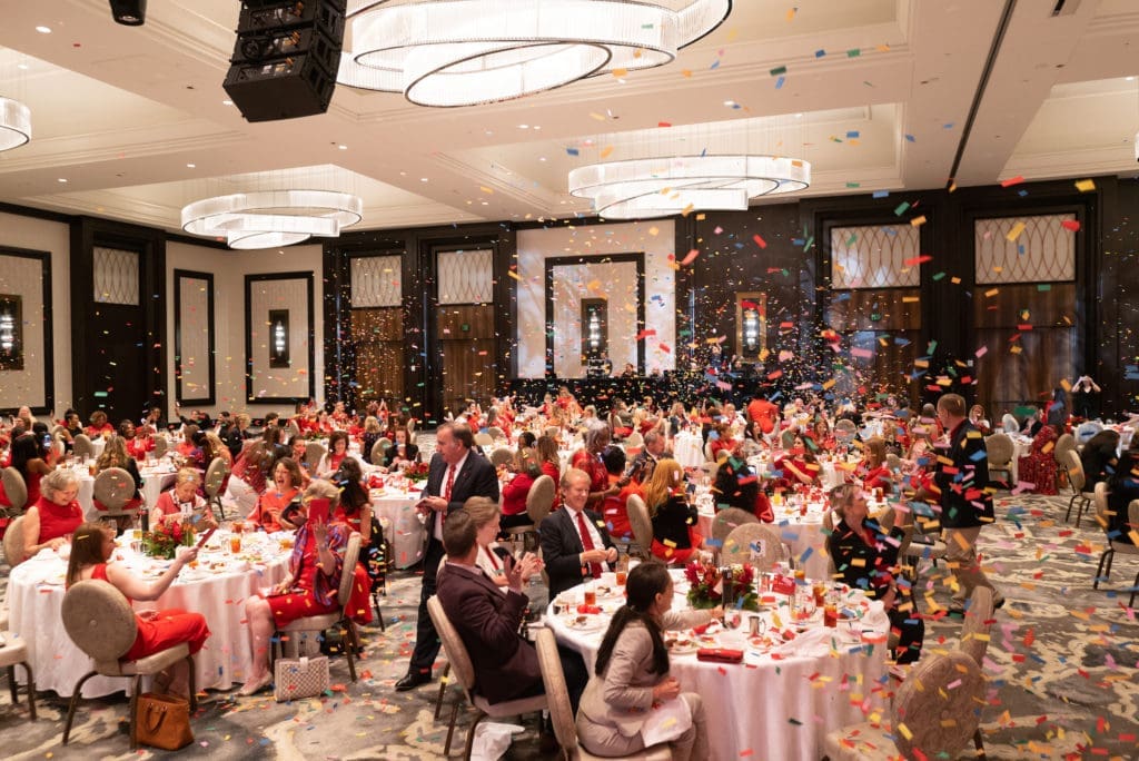 The American Heart Association's 'Go Red for Women' luncheon at the Post Oak Hotel concludes with a confetti salute (Photo by Daniel Ortiz)