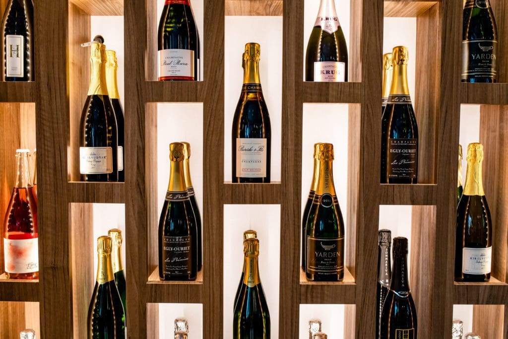 Hamsa features a champagne wall featuring some of vintage bottles of the famed sparkler. (Photo by Kirsten Gilliam)