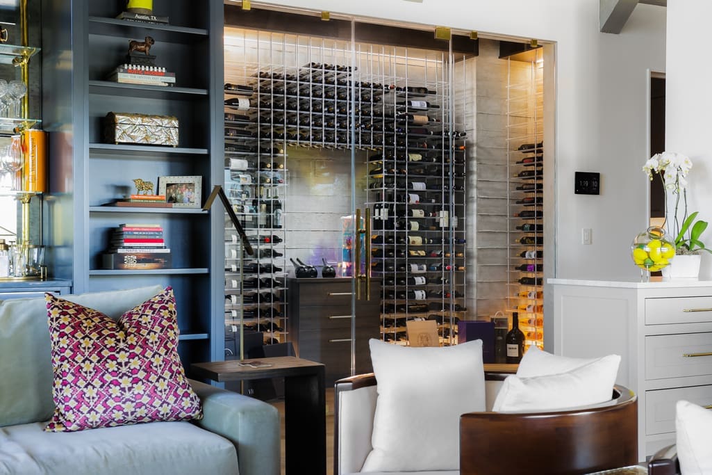 The great room living area at 8 Oaks in the Texas Hill Country provides ample wine storage (Photo courtesy of Douglas Elliman Real Estate)