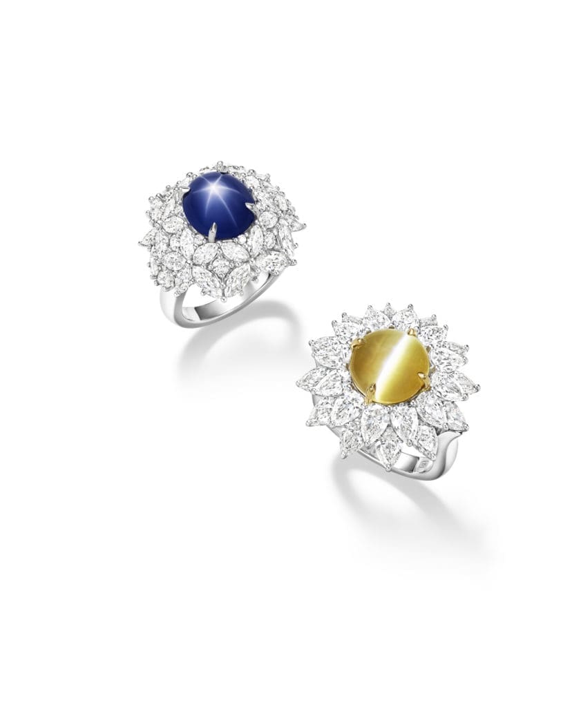 From left: Harry Winston Star Sapphire ring from the Marvelous Creations Collection with 6.82-carat oval cabochon star sapphire center stone and marquise and round brilliant diamonds, set in platinum; Cat's Eye Chrysoberyl ring with 7.60-carat cat's eye chrysoberyl and pear-shaped diamond petals, set in platinum.
