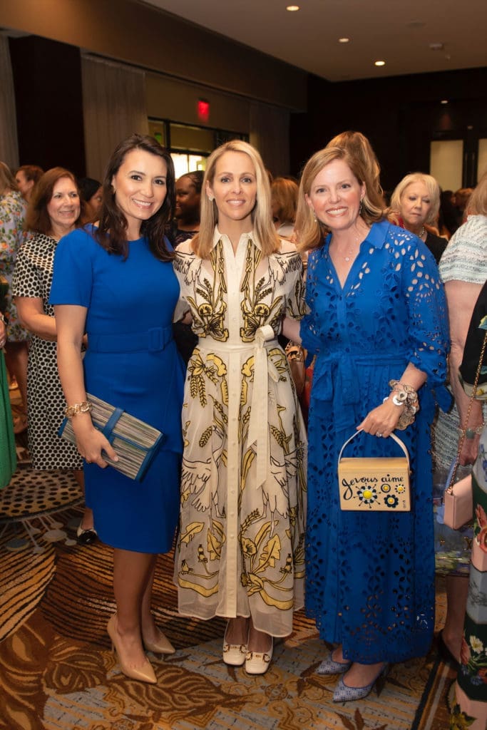 Kim Schlegel Whitman, Centennial Milestones Luncheon Emcee Meredith Land, and Alli Eagan. (Photo by Tamytha Cameron)