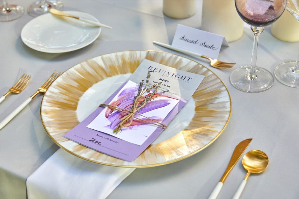 At each place setting, guests found a bundle of lavender and a small piece of handmade art made by a child at The Family Place. (Photo by Tamytha Cameron, Nate Rehlander, and Hal Samples)