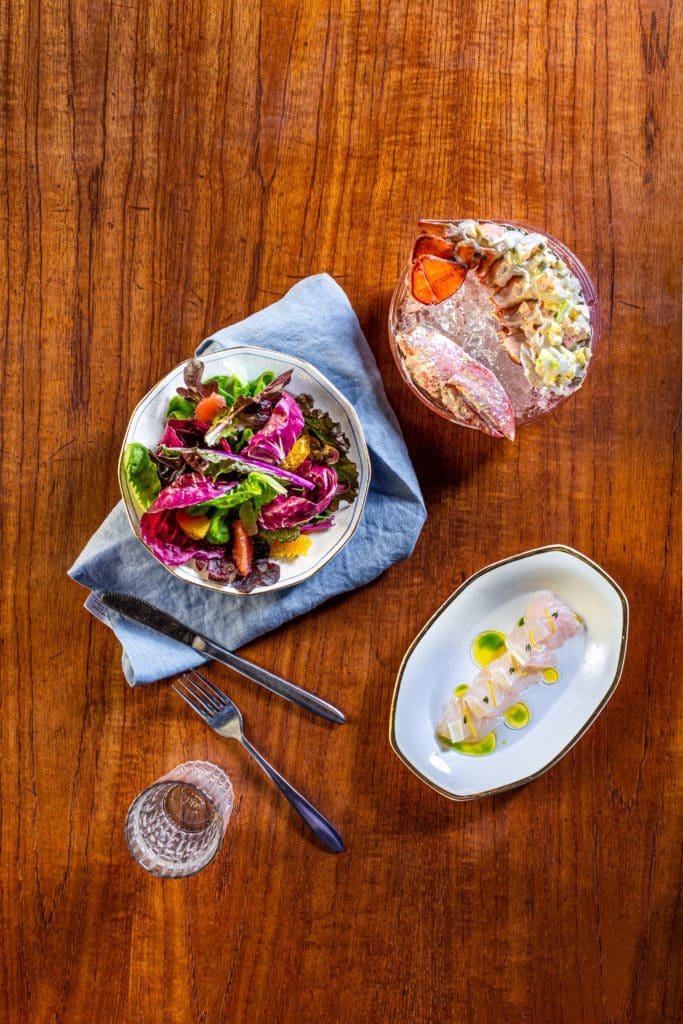 Cool dishes at the upcoming restaurant The Fancy at Hotel Lucine include raw Gulf Coast snapper and a chilled lobster. (Photo by Jenn Duncan)