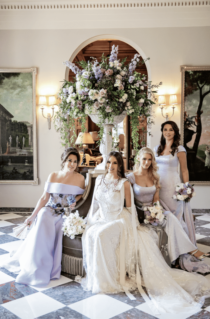 Mother of the bride Cherie Flores, the bride and sisters Alanna Flores and Olivia Flores (Photo by John Cain Photography)