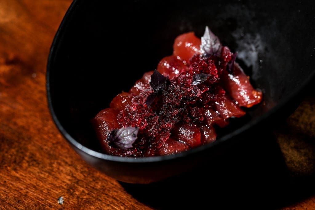 The Tuno Crudo at Garrison with yuzu koshö, huckleberry, and hibiscus. 