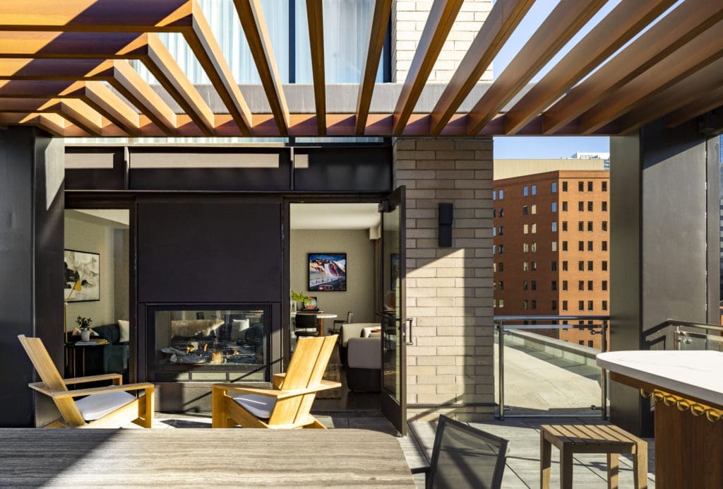 The Thompson Suite at Thompson Denver has its own patio balcony overlooking the Rocky Mountains. (Photo by Julie Soefer)