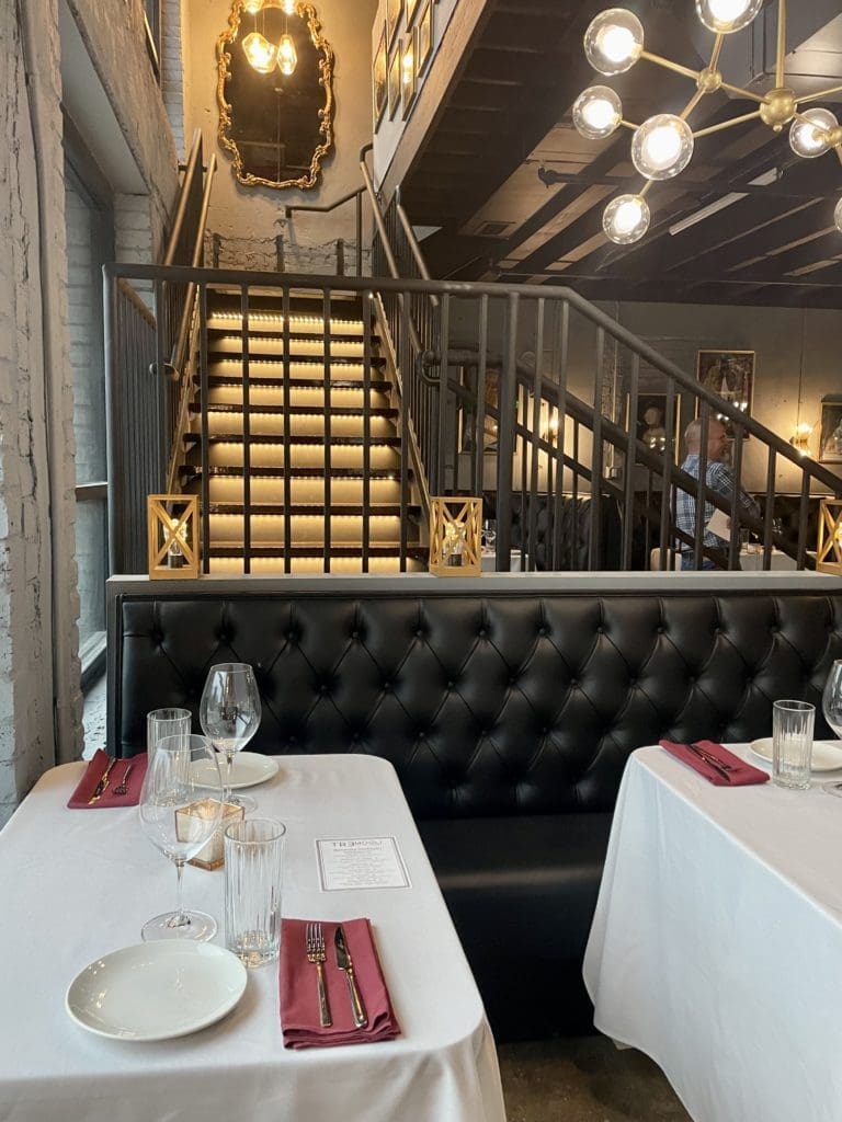 Tre Mogli with its Rat Pack era vibe and white tablecloth menu. Photo by Courtney Dabney.