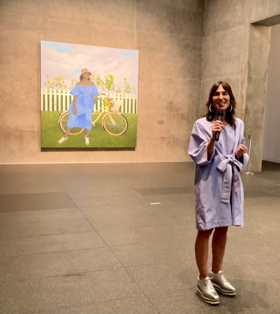 Chief Curator Andrea Karnes stands at the entrance to The Modern's new exhibit. Photo by Courtney Dabney.