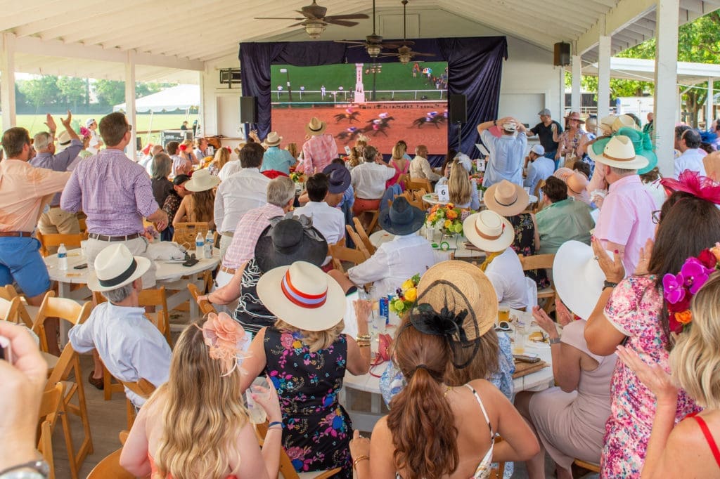 The Kentucky Derby on view at the Bo's Place 'Hats, Hearts & Horseshoes' benefit at Houston Polo Club. (Photo by Jacob Power)