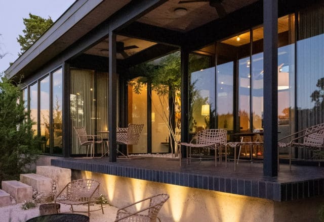 The outdoor spaces in this handcrafted Kessler Woods home in Dallas were designed by Christa McCall of Paper Kites Studio. (Photo by Stephen Karlisch and Robert Tsai)
