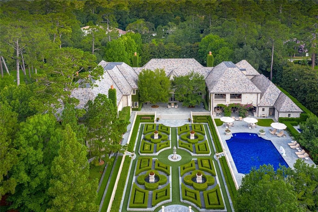 Parterre gardens are part of the meticulous landscaping at 120 Carnarvon. (Photo by Nathan Schroder/Douglas Elliman)
