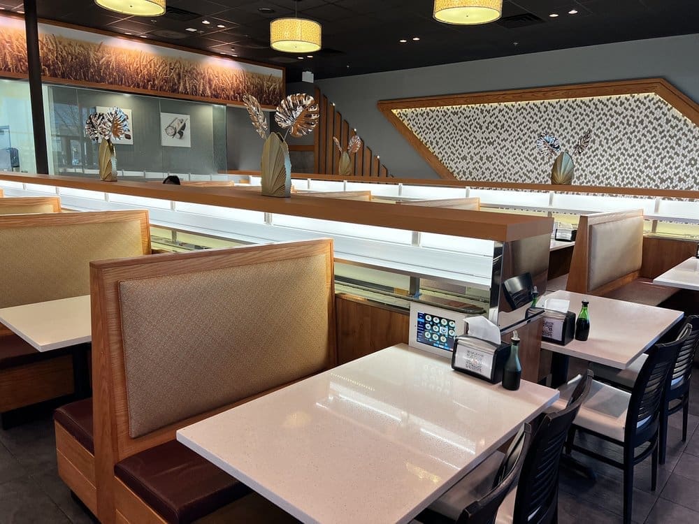 Akarii Revolving Sushi - You order via tablet and the freshly prepared plates of sushi arrive to your table by conveyor belt.