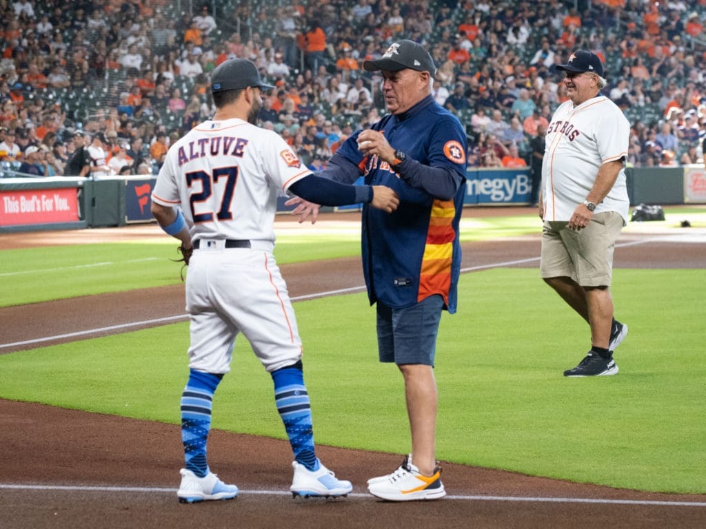 Jose Altuve and his dad Carlos Altuve enjoyed the Father's Day moment at Minute Maid. (Photo by F. Carter Smith)