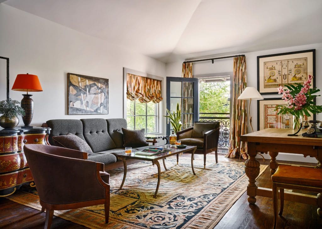 A seating area inside the Marcia apartment includes a Stark Aubusson rug. (Photo by Stephen Karlisch).