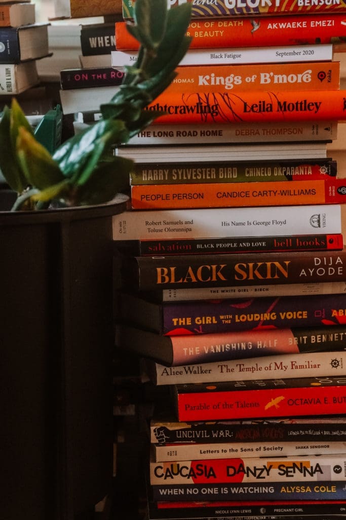 A selection of Black literature at the Hamm home. The hosts own the bookstore Kindred Stories, in the heart of the Third Ward. (Photo by William Issac)