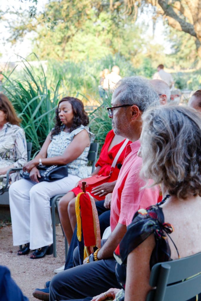 Guests sat in a circle for meditation at the Summer Soulstice Dinner. (Photo by Liz Silva)