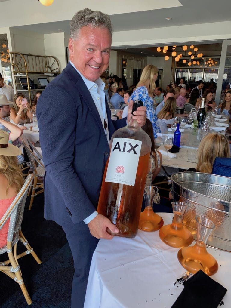 Brasserie 19 owner Charles Clark displays the Nebuchadnezzar (equal to 20 bottles) of rosé, a special for his Rosé All Day bash. (Photo by Shelby Hodge)