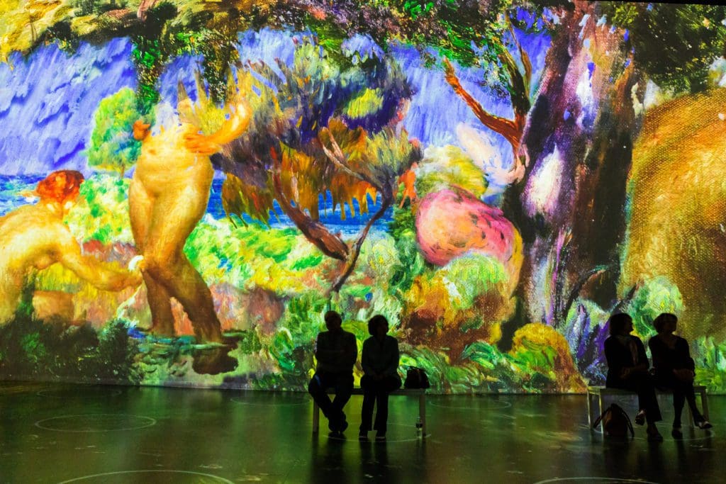 Through Lighthouse Immersive's dazzling animation work, paintings morph and blend into one another at "Immersive Monet & The Impressionists." (Photo by Patrick Hodgon)