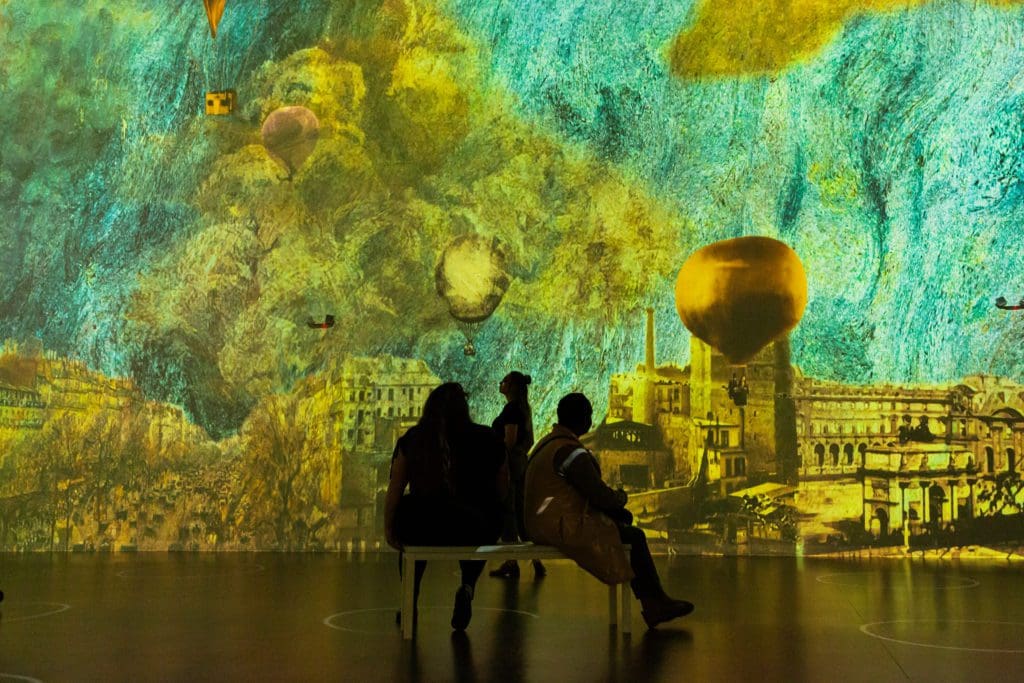 As seen in "Immersive Monet & The Impressionists," the artists often painted the sky and cityscapes. (Photo by Patrick Hodgon)