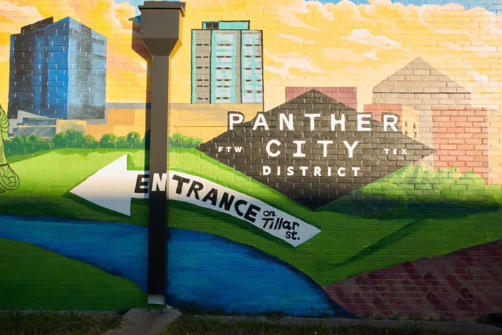 Panther City District's first place-making mural is a sign of the neighborhood's change.