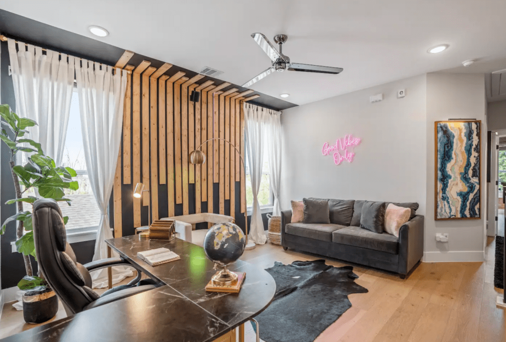 The Good Vibes HTX Airbnb features speedy wifi at 320 Mbps, plus a dedicated workspace in a common area.