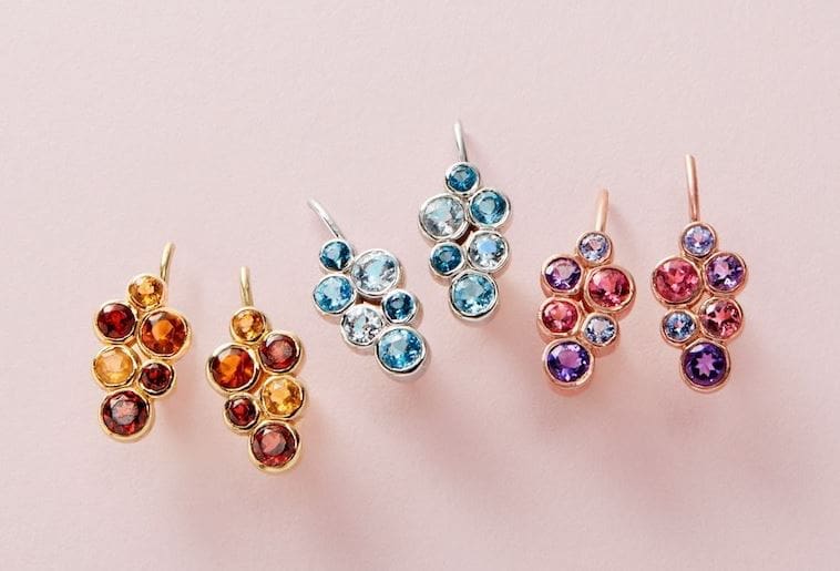 From left to right: garnet and citrine bubble climber earrings ($800); blue topaz bubble climber earrings ($800); amethyst, tanzanite, and pink tourmaline bubble climber earrings ($950).  