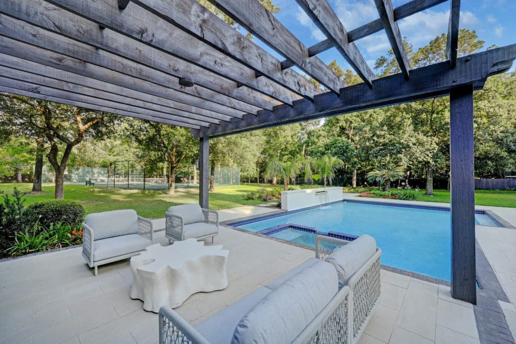 Poolside entertaining at 402 Timberwilde Lane (Photo by TK Images)