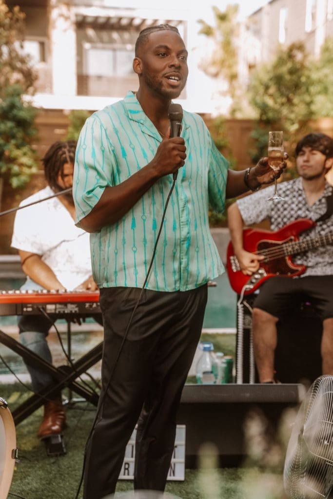Host Troy Hamm welcomes guests and extolls CoolxDad's mission. (Photo by William Issac)