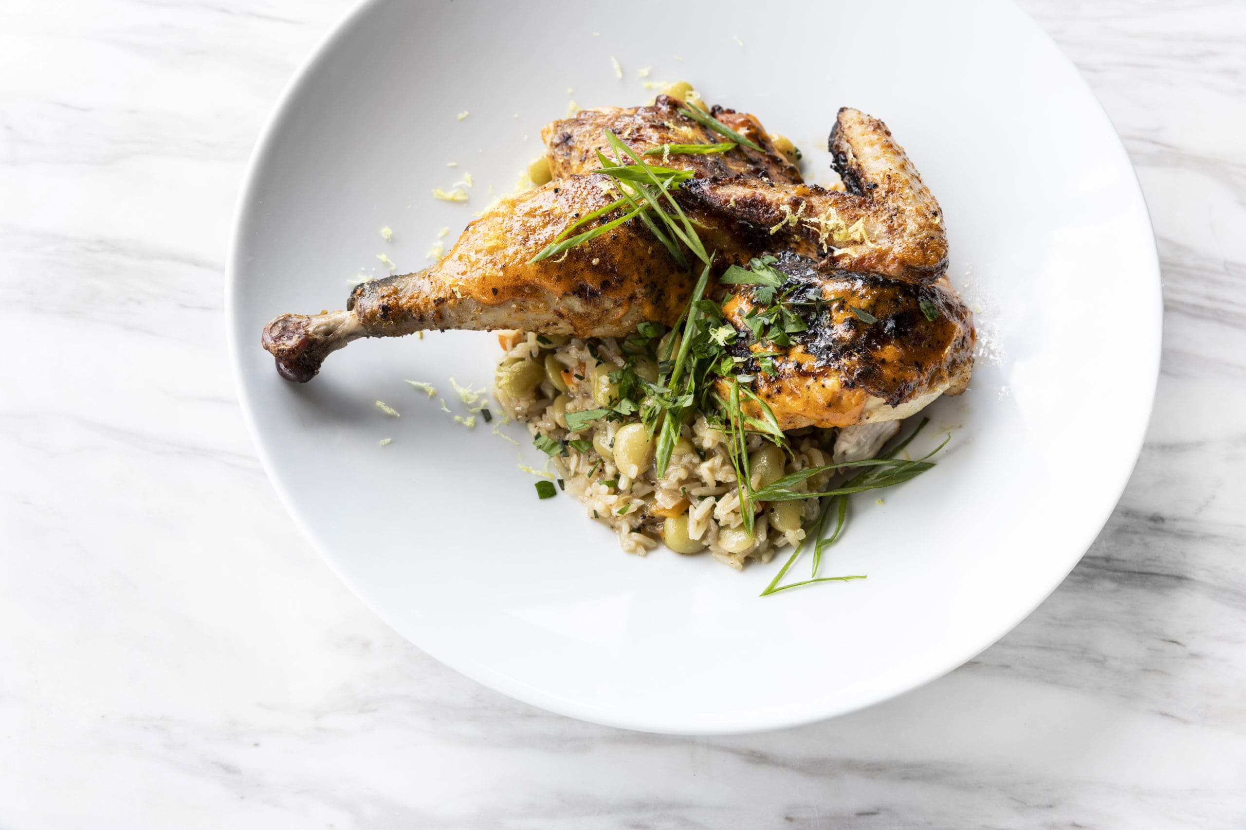 If you want other options besides beef, there's Fried Holmes Chicken on the Georgia James menu served with dirty rice. (Photo by Julie Soefer)