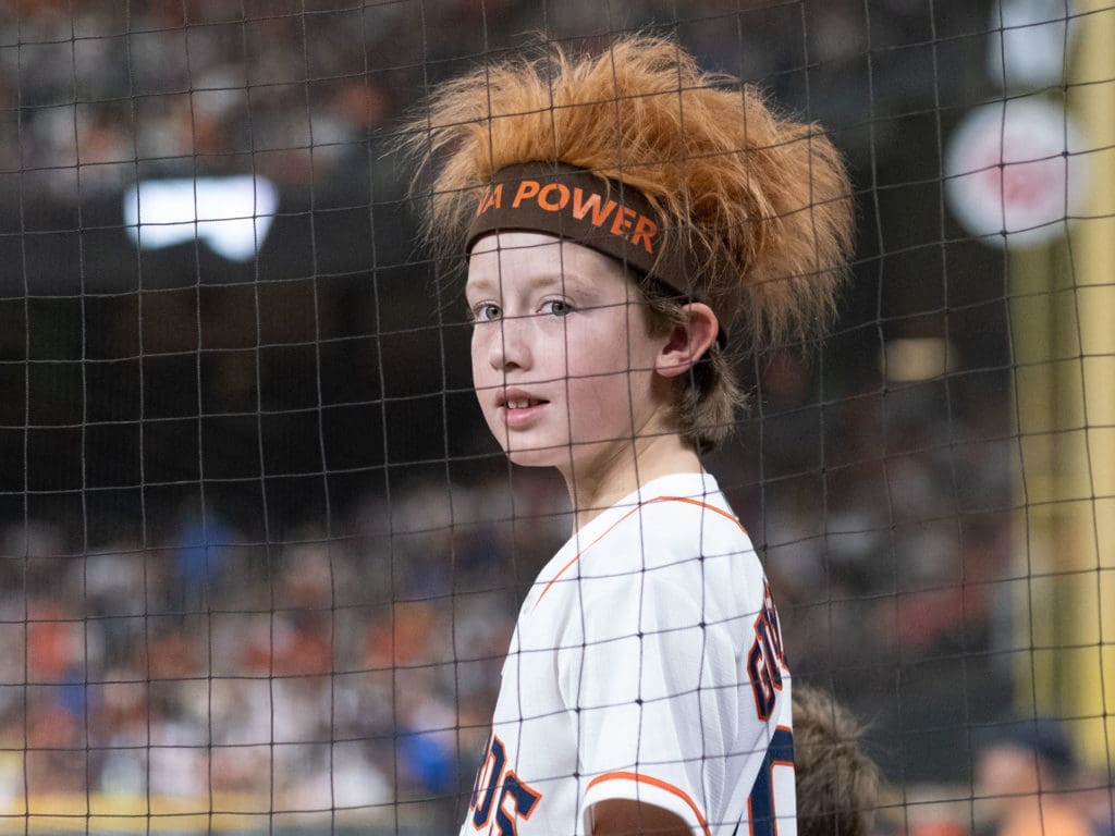 Yes, there are still Yuli Gurriel fanatics out there. This kid channels the hair. (Photo by F. Carter Smith)