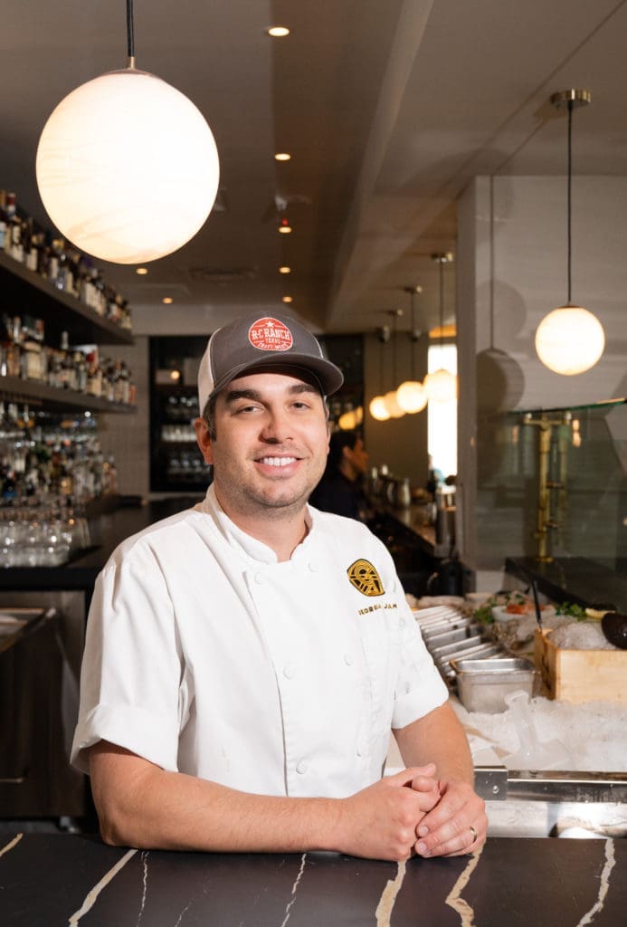 Stepping behind the proverbial range at Georgia James is talented chef Greg Peters. Photo by Michael Anthony.