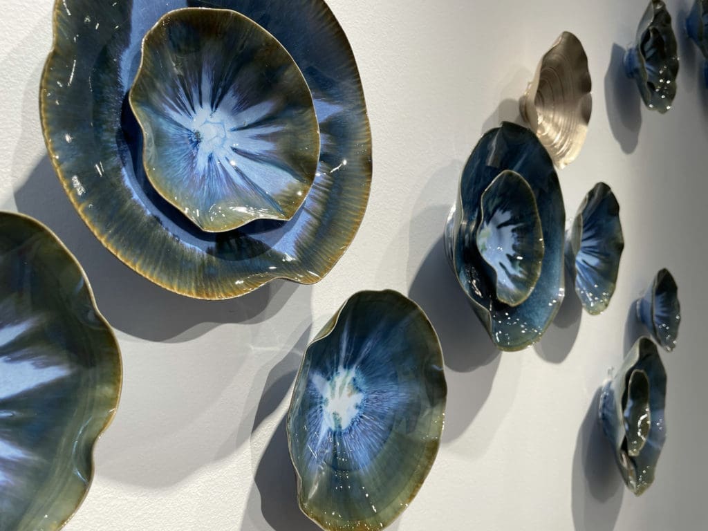 Lucrecia Waggoner's glazed porcelain vessels at "Wanderlust" opening at Laura Rathe Fine Art (Photo by Johnny Than)
