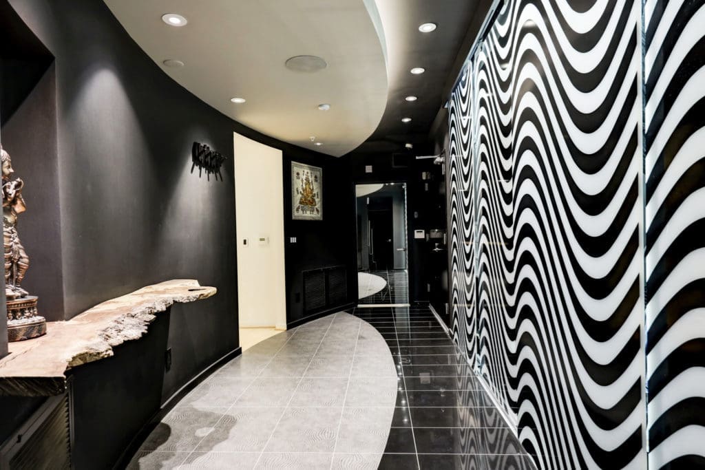 The sleek, contemporary entry to the Houston penthouse at 102 Quitman (Photo by TK Images)