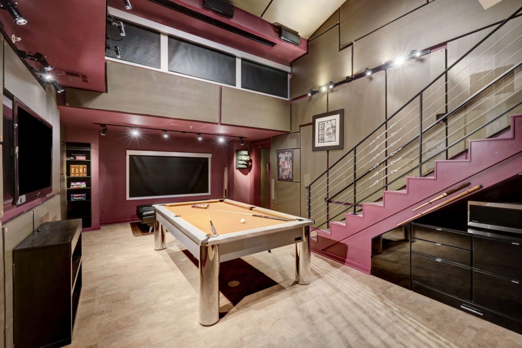 A party/pool room at the 102 Quitman penthouse. (Photo by TK Images)