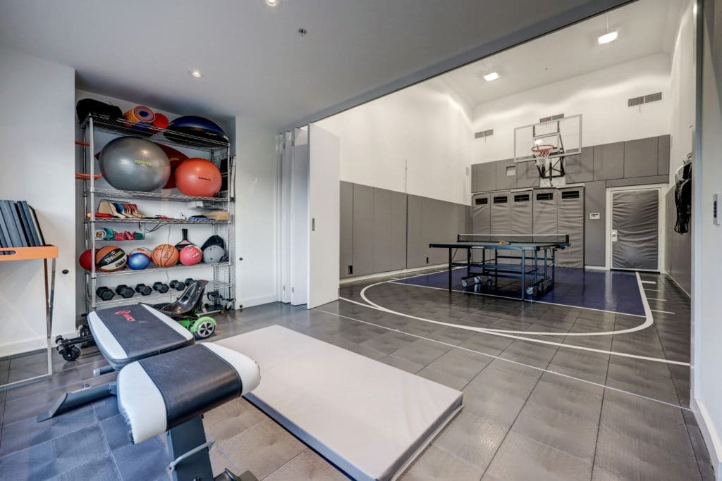 Ping pong and exercise in the penthouse at 102 Quitman. (Photo by TK Images)