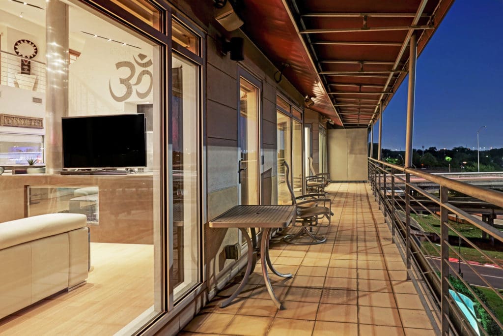 The penthouse at 102 Quitman has wrap-around balconies. (Photo by TK Images)