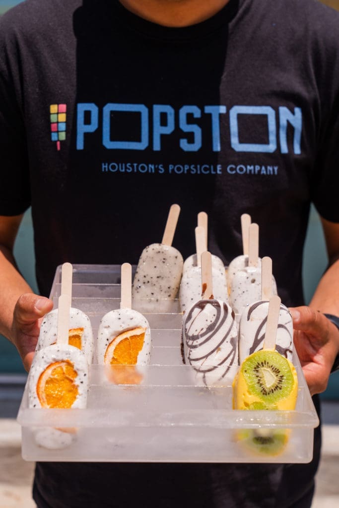 Creator Jonathan Delgado whips up creamy gelato-style popsicles at his new East End shop, Popston. (Photo by Michael Anthony)