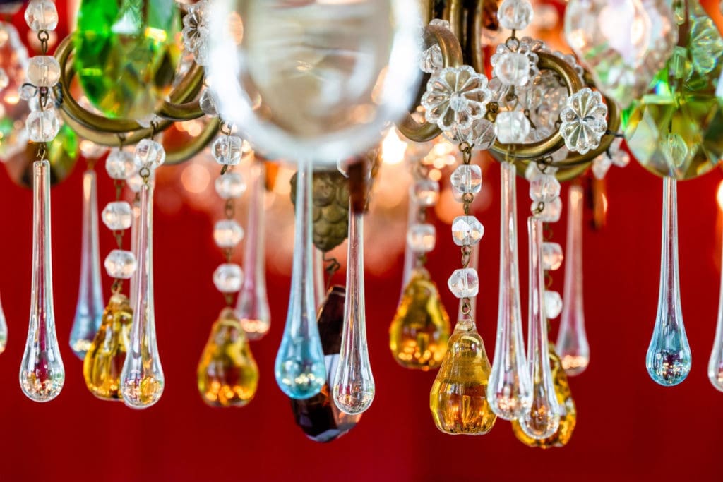 Colorful detailing of the more than one dozen vintage chandeliers that grace the Frida Private Room at Flora. (Photo by Kirsten Gilliam)