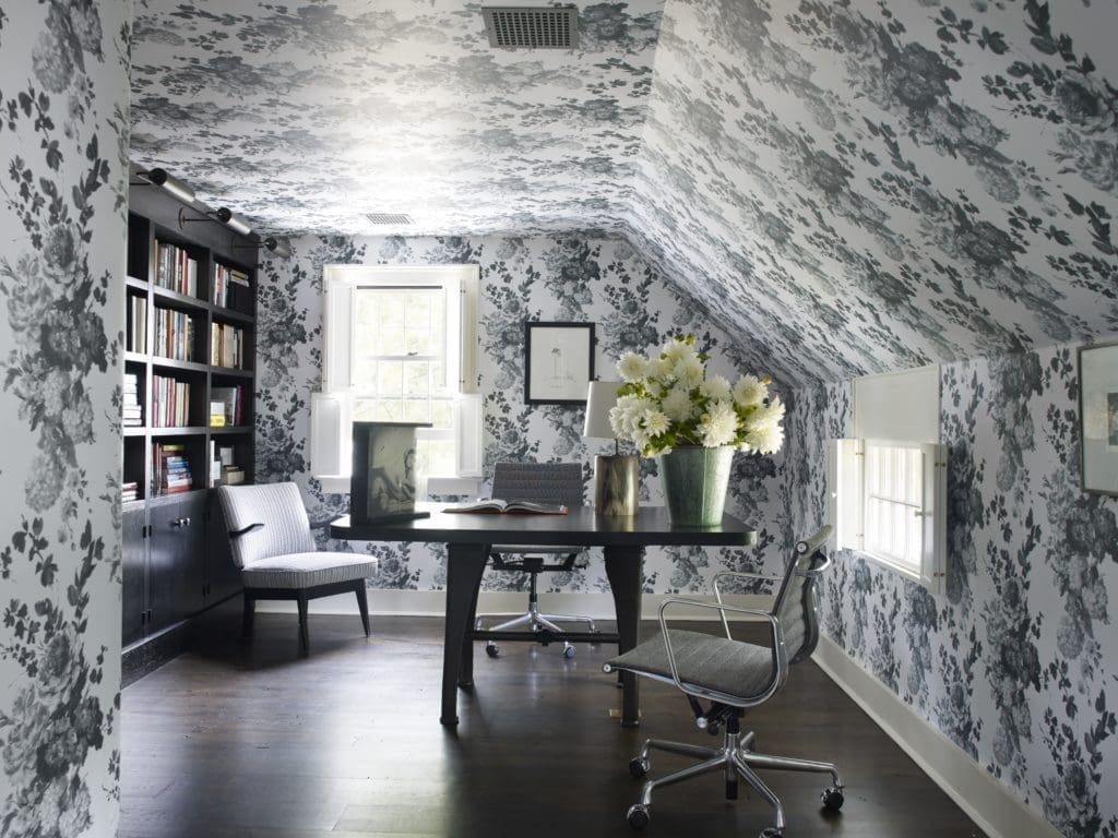 Sills chose an English floral paper for the upstairs study of this 18th-century New England home, which is set on 50 acres of picturesque apple orchards. (Photo by William Waldron)