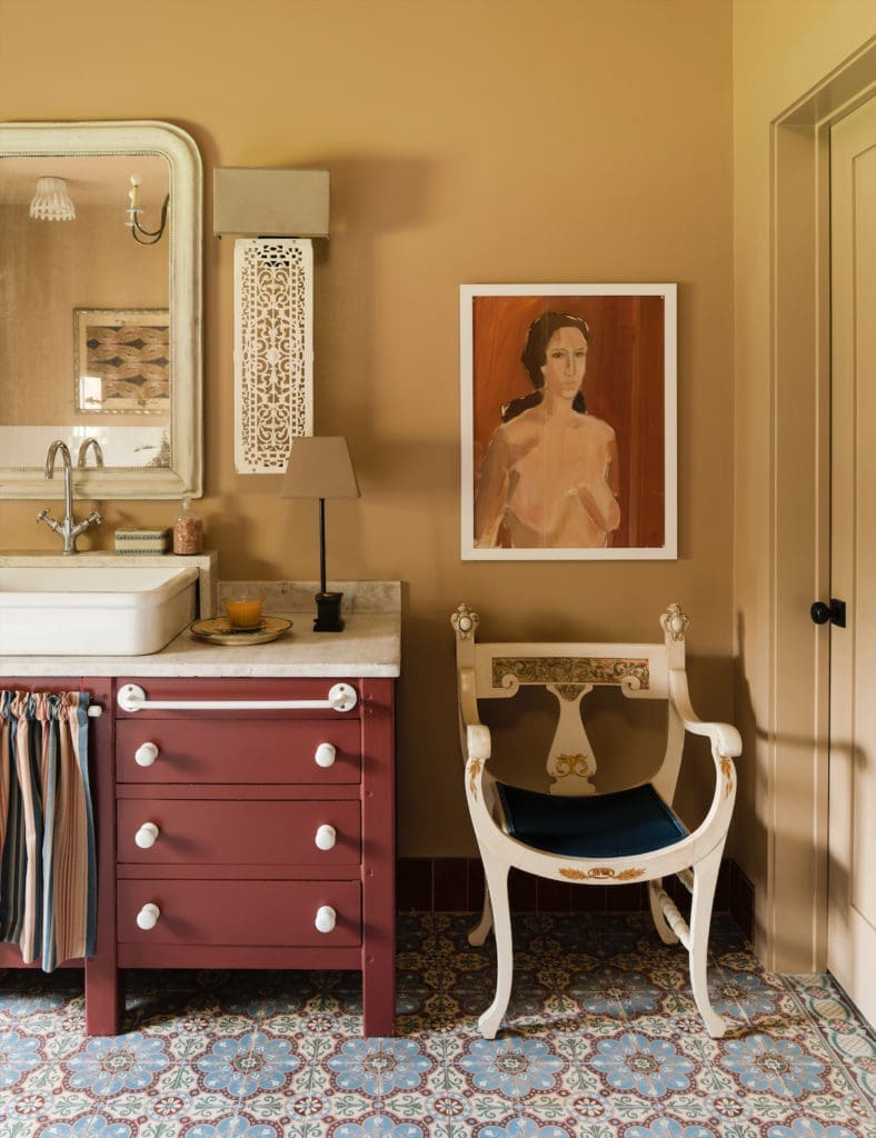 In Brown’s bath, the floor is antique encaustic tiles from an old house in Belgium. (Photo by Jack Thompson)