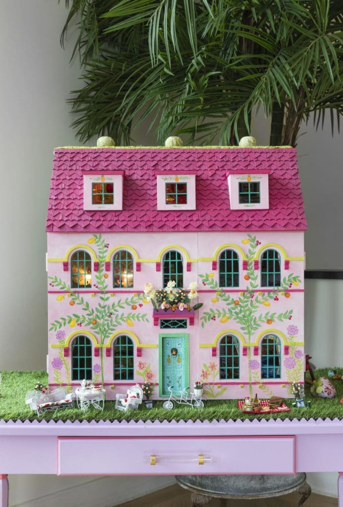 The traditional dollhouse is one of three designs by Newbury Architecture, constructed by Stetzer Builders, for A Shelter for Cancer Families' gala auction. (Photo by Claudia Casbarian for Julie Soefer)