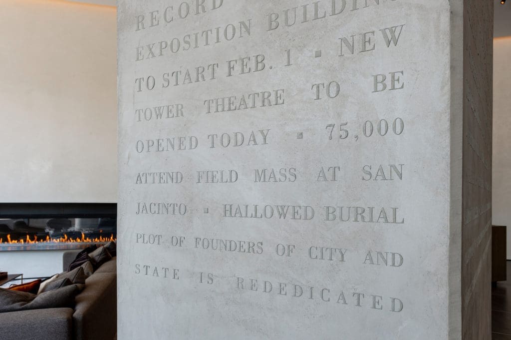A column of old Houston Chronicle headlines brings a distinctive touch to The Brava lobby.