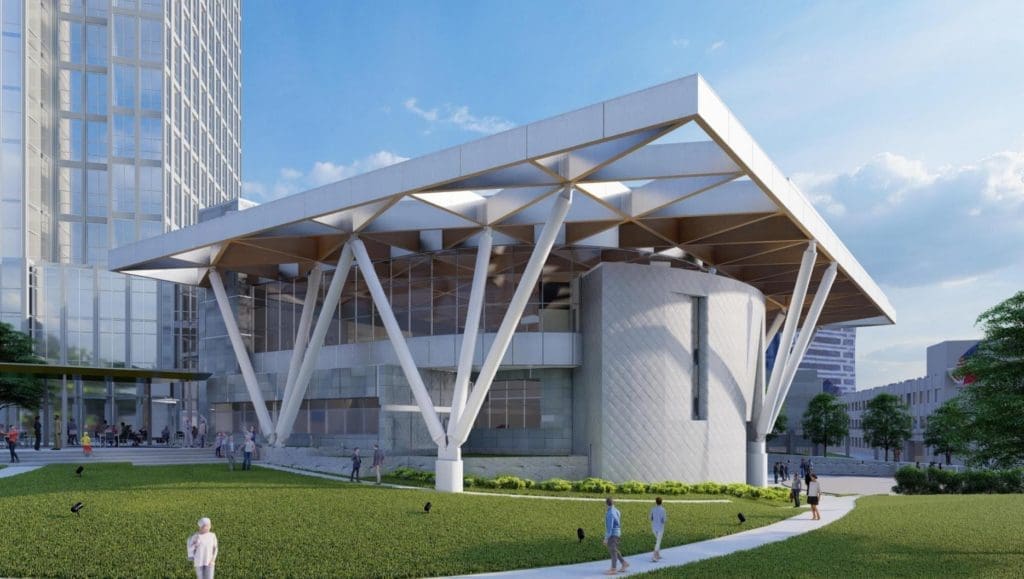 The new council chamber adds glass walls on two sides, providing a view to the city beyond. (Rendering courtesy Brinkley Sargent Wiginton Architects).