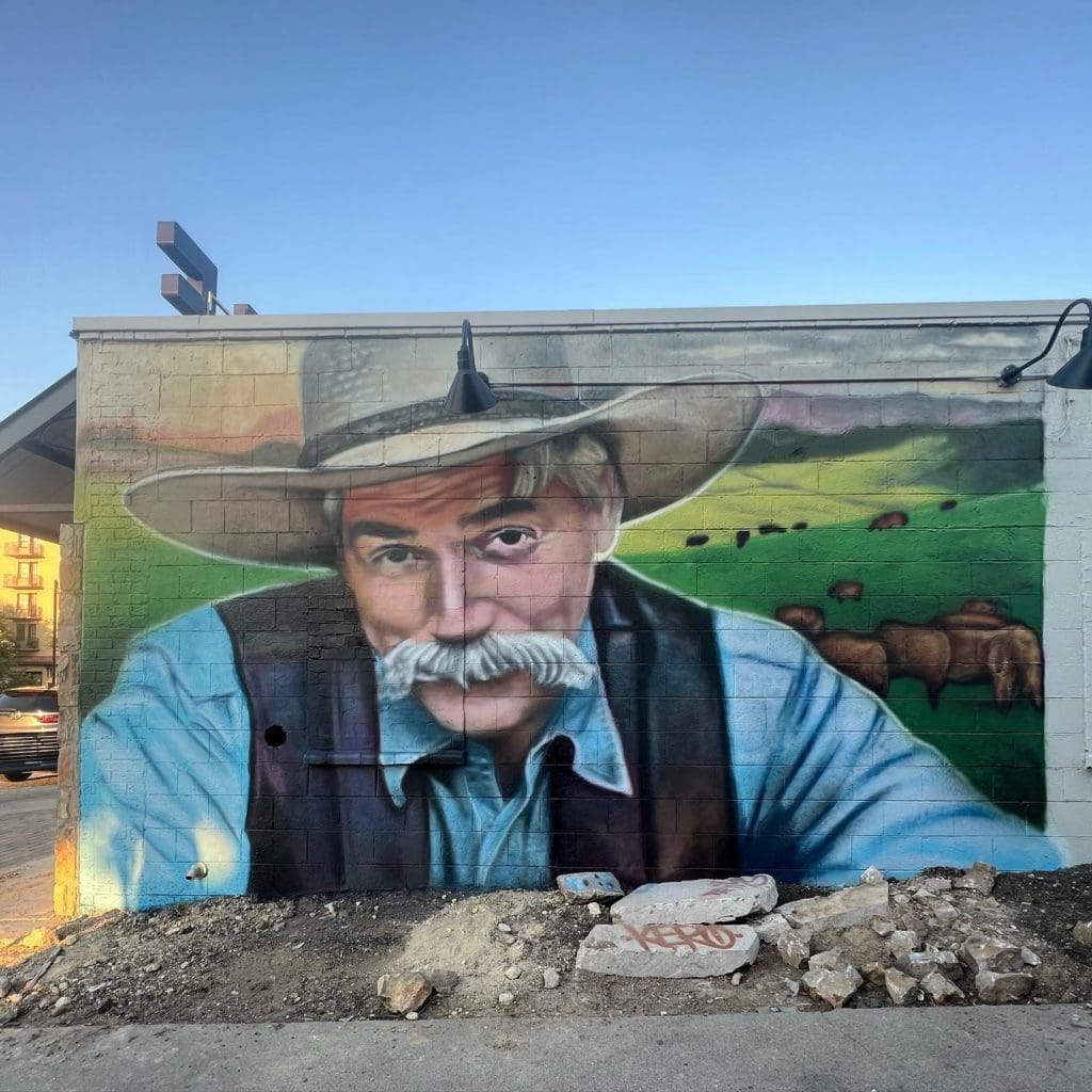 The side wall now sports a familiar face. Sam Elliot from the series 1883 painted by Juan Velazquez. Photo by Velazquez Murals.