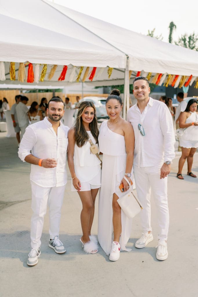 Khizar & Zoya Hanif, Nancy & Jose Almodovar at the Nan & Company Properties party held during White Linen Night in The Heights. (Photo by Nan Studios)