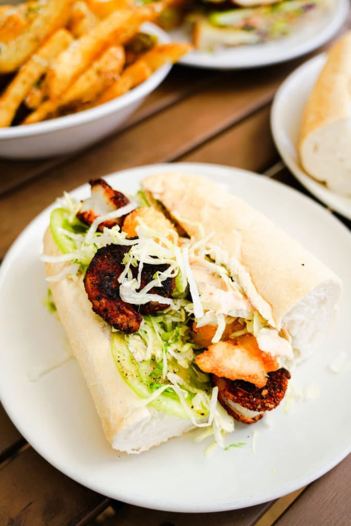 The Tan Po Boy at the new Lagniappe Kitchen and Bar is made with blackened shrimp and fried oysters. (Photo by Mikah Danae)