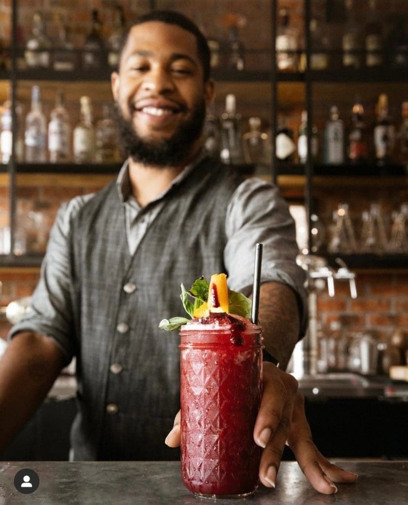 Serving up specialty cocktails like their Blackberry Smash.