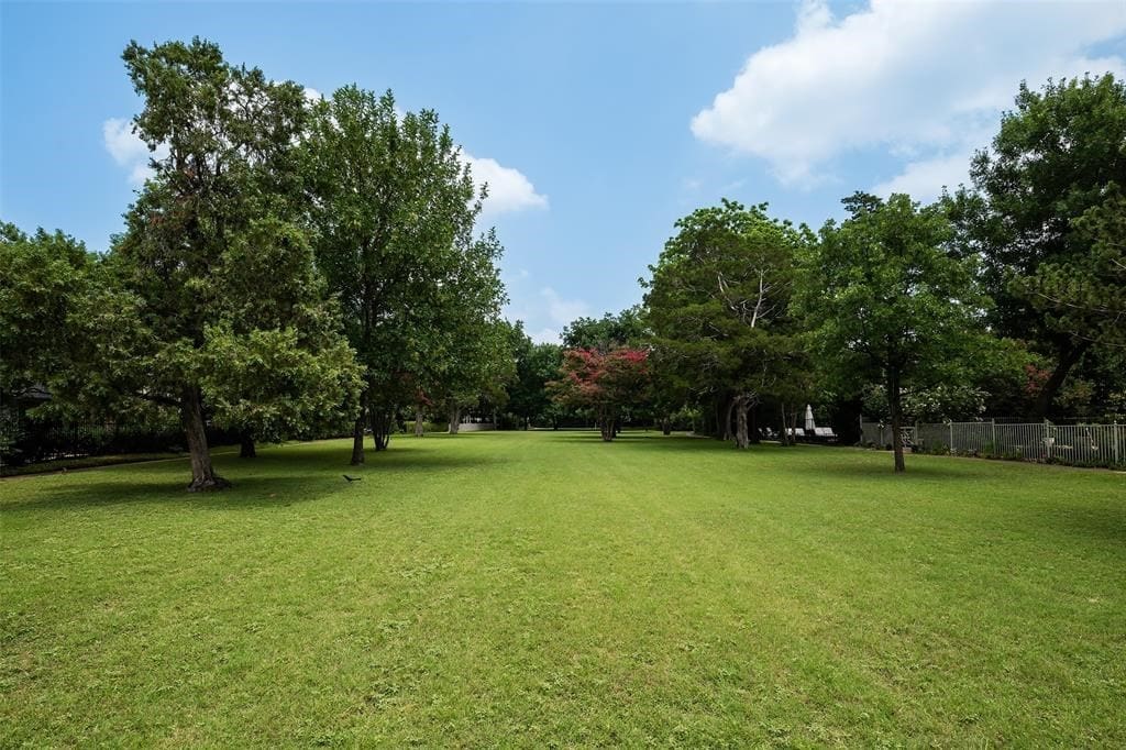 The gated backyard backs directly up to one of Green Parks' prized greenbelts.